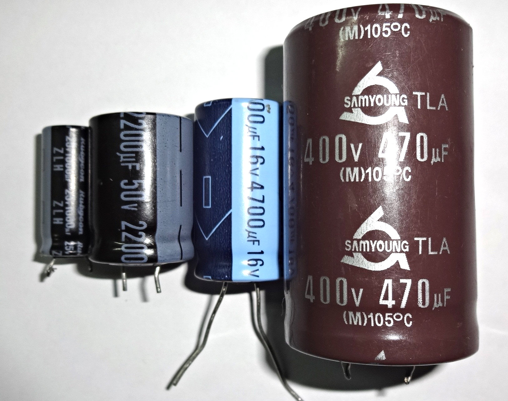 Figure 4 — A single large aluminum electrolytic capacitor. A big can charged to its rated voltage stores enough energy to deliver a serious, occasionally lethal, jolt long after power is removed — …