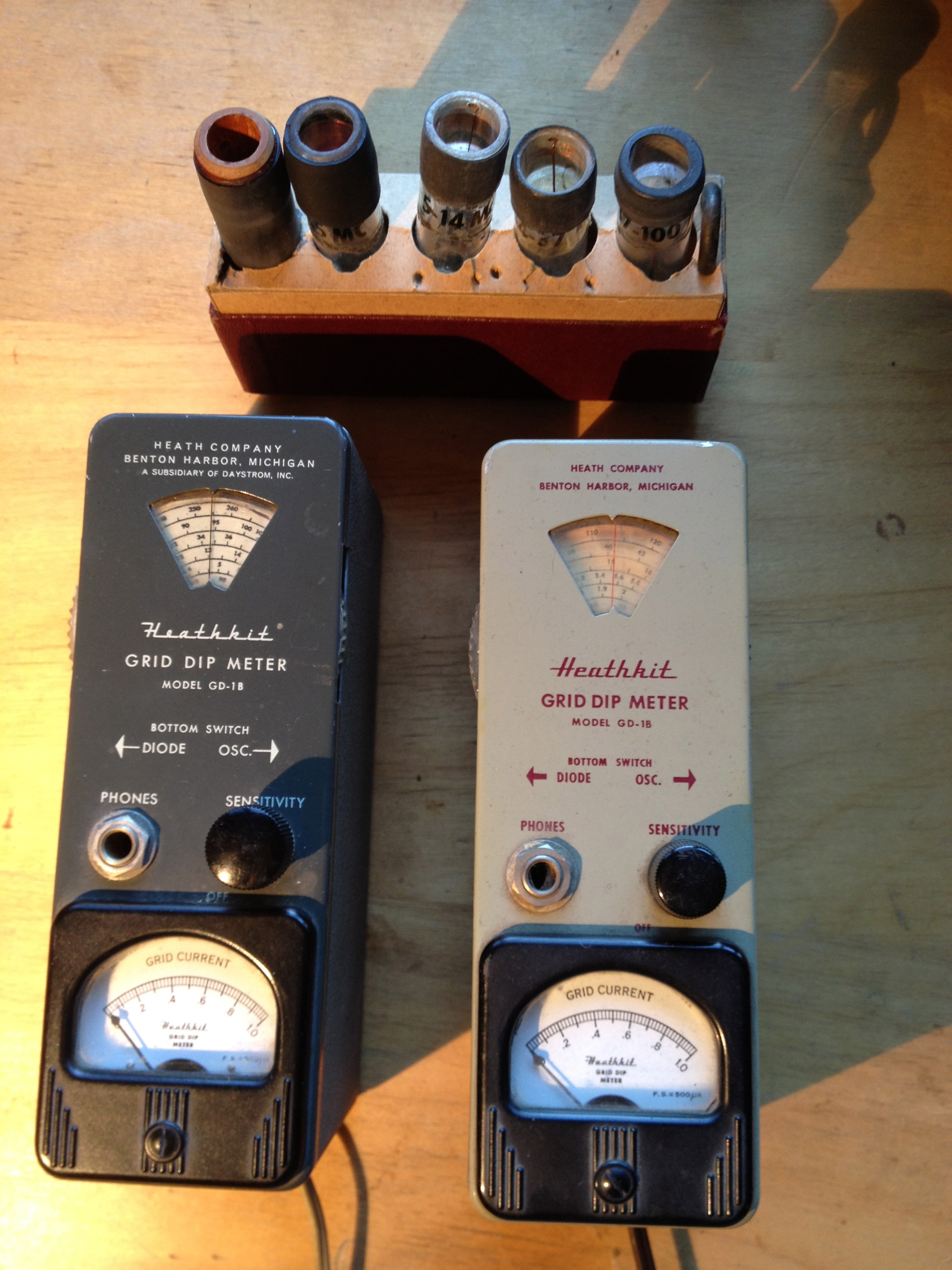 Figure 9 — A grid-dip meter with a set of plug-in coils. Loosely coupled to a resonant circuit, its meter dips at resonance, reading out the frequency from which inductance (with a known capacitor)…
