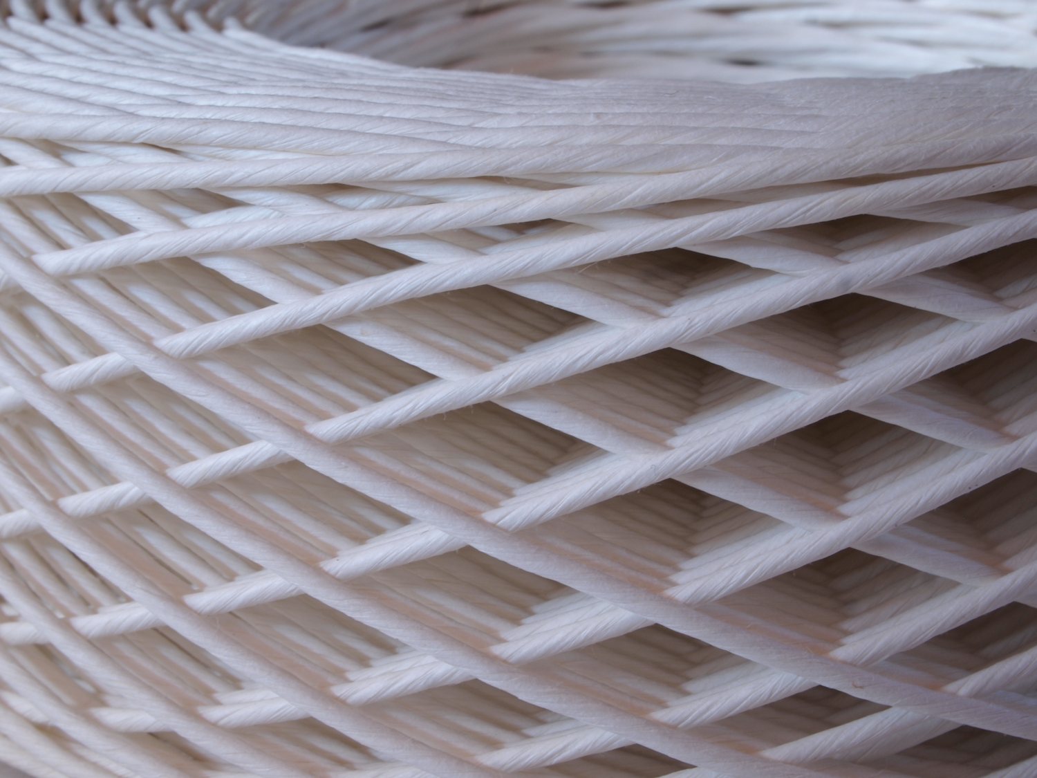 Figure 8 — A basket-weave (basket-wound) RF coil, the wire threaded through an odd number of slots so that adjacent layers cross near ninety degrees. The open, airy construction keeps stray capacit…