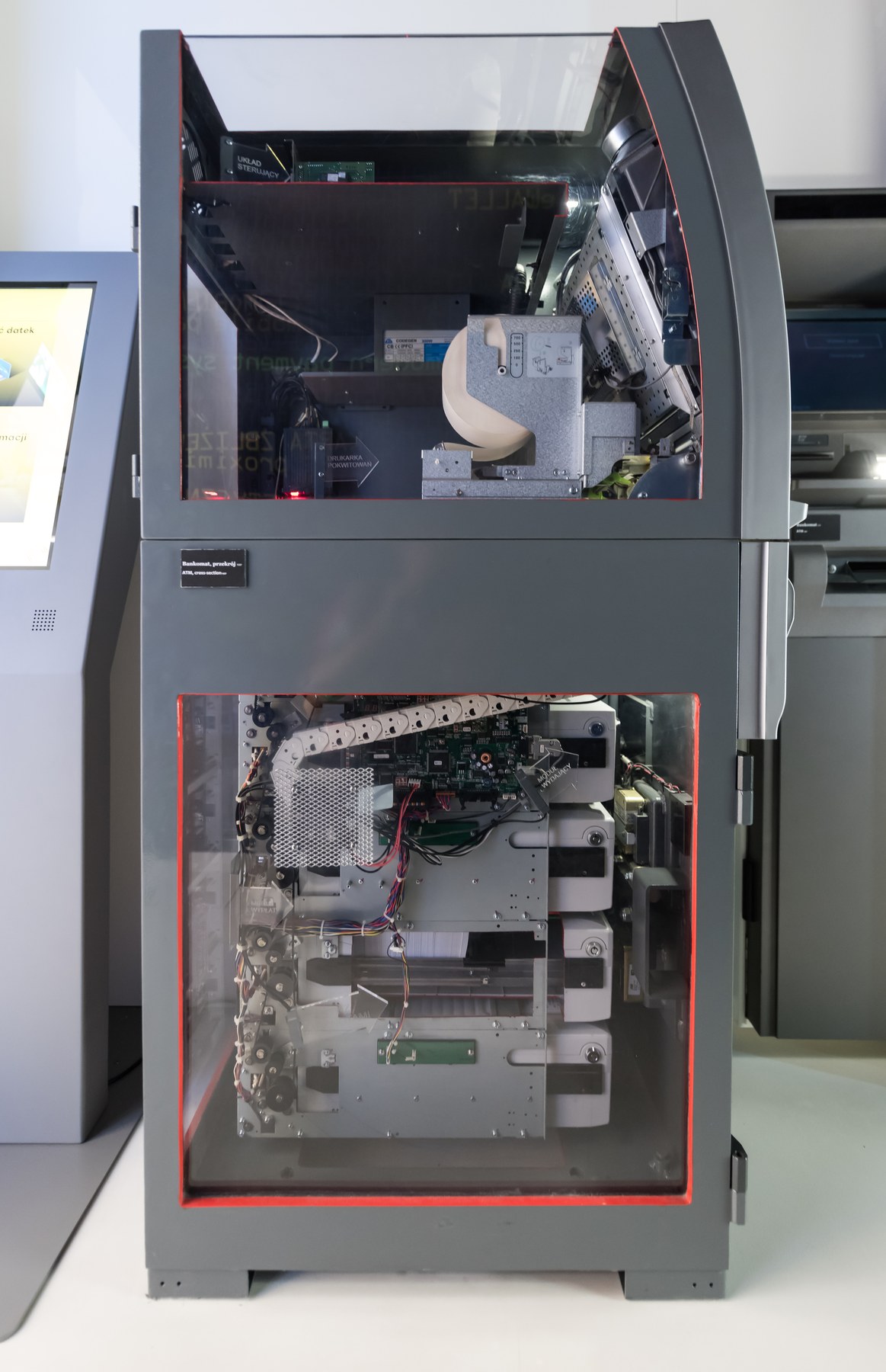 Figure 2 — A cash machine with its panels off. The 2014 Doom demonstration ran on Windows XP inside a machine like this one; the work was wiring the front-panel buttons to a keyboard-emulation board, not port…
