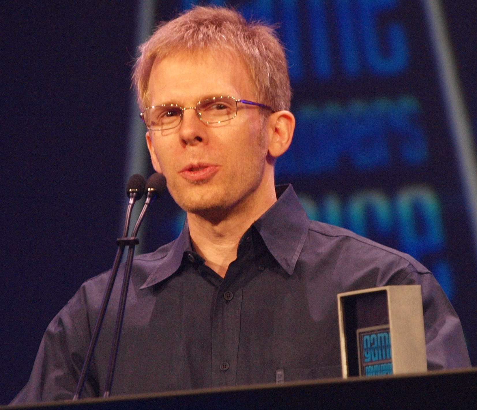 Figure 3 — John Carmack, who designed the renderer and wrote the December 1997 release note. His judgement that the code was portable enough to be modified for "just about any" device is the closest thing the…