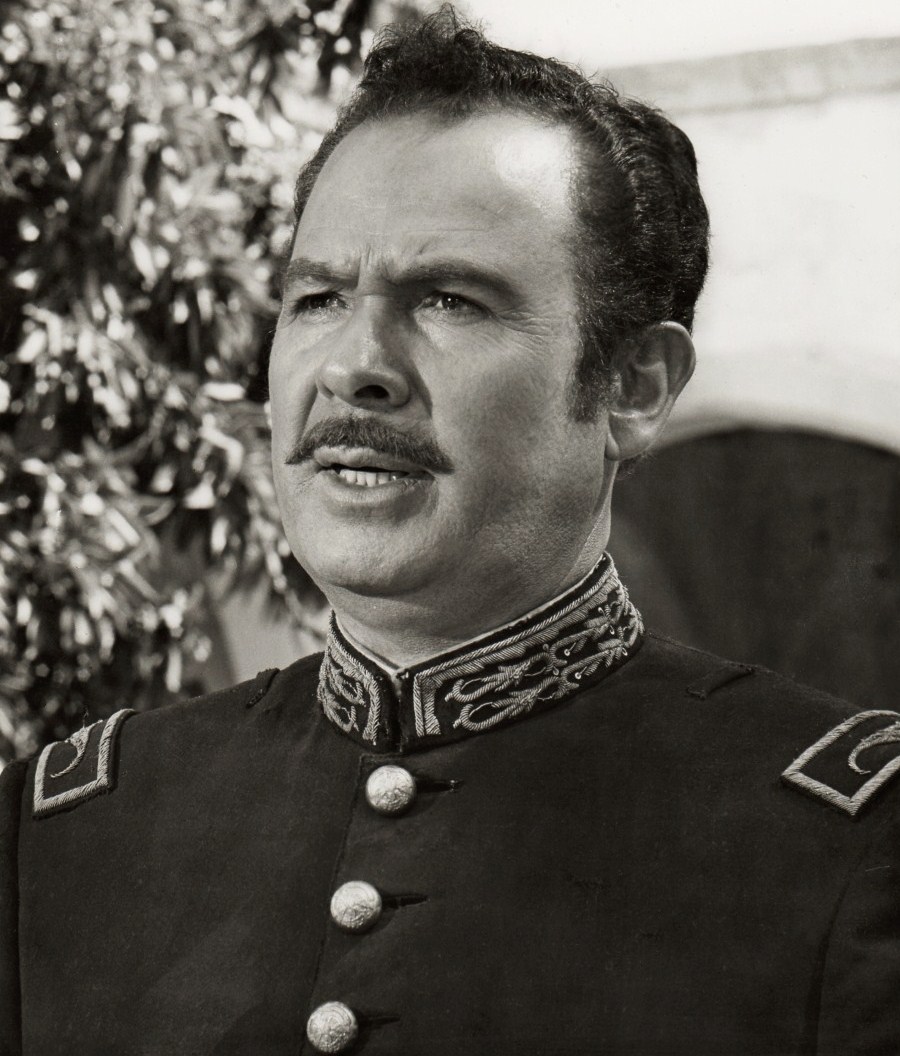 Figure 2 — 2 — Antonio Aguilar in The Undefeated (1969). The Western genre supplied the visual vocabulary of hat-as-moral-marker that security culture would inherit decades later. By the time the met…