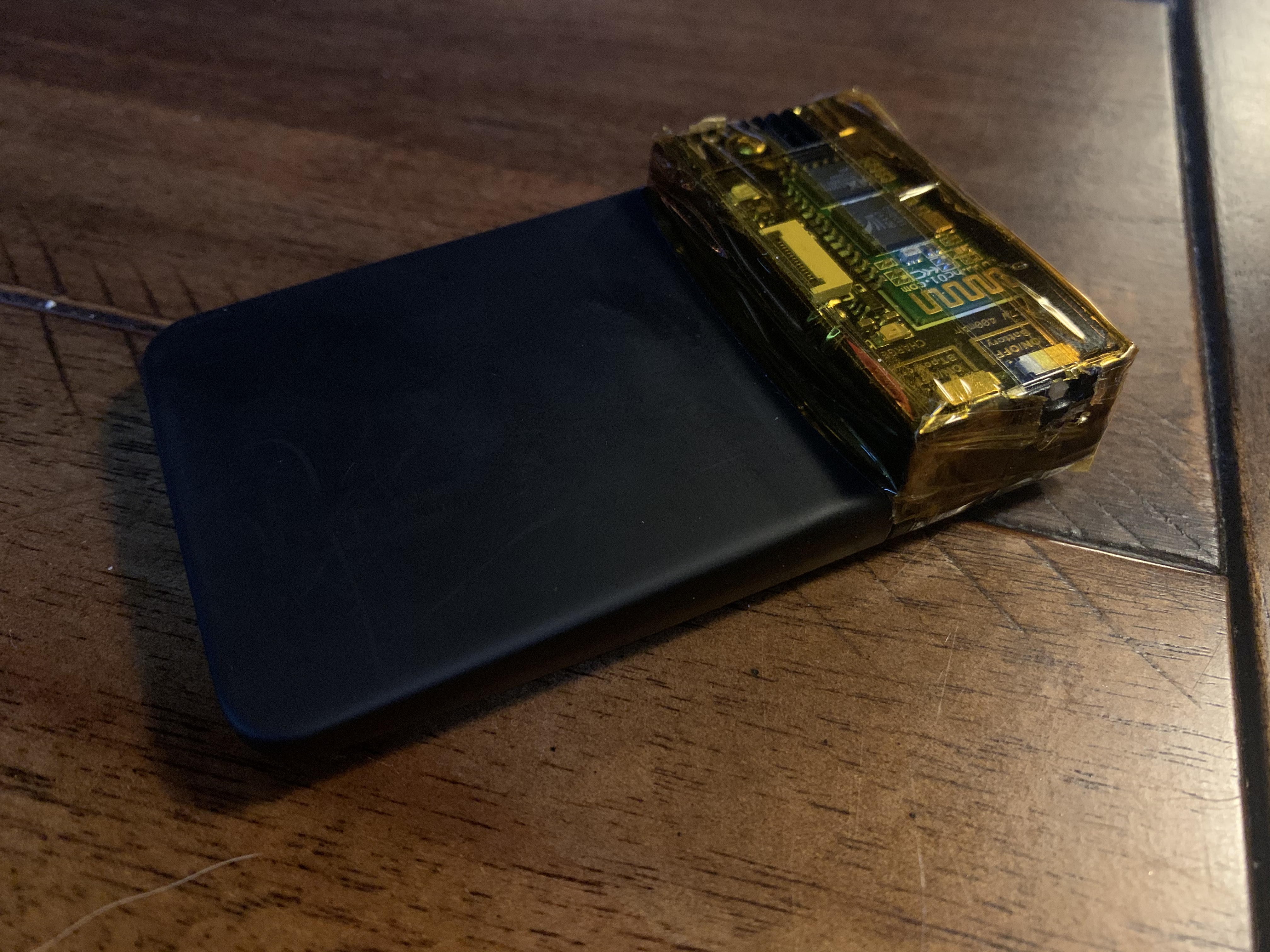 Figure 3 — A Proxmark3 RDV4 with the Bluetooth + battery accessory module attached — the canonical field-research configuration for the Proxmark3. The RDV4's design accommodates a daughterboard expansion bus …