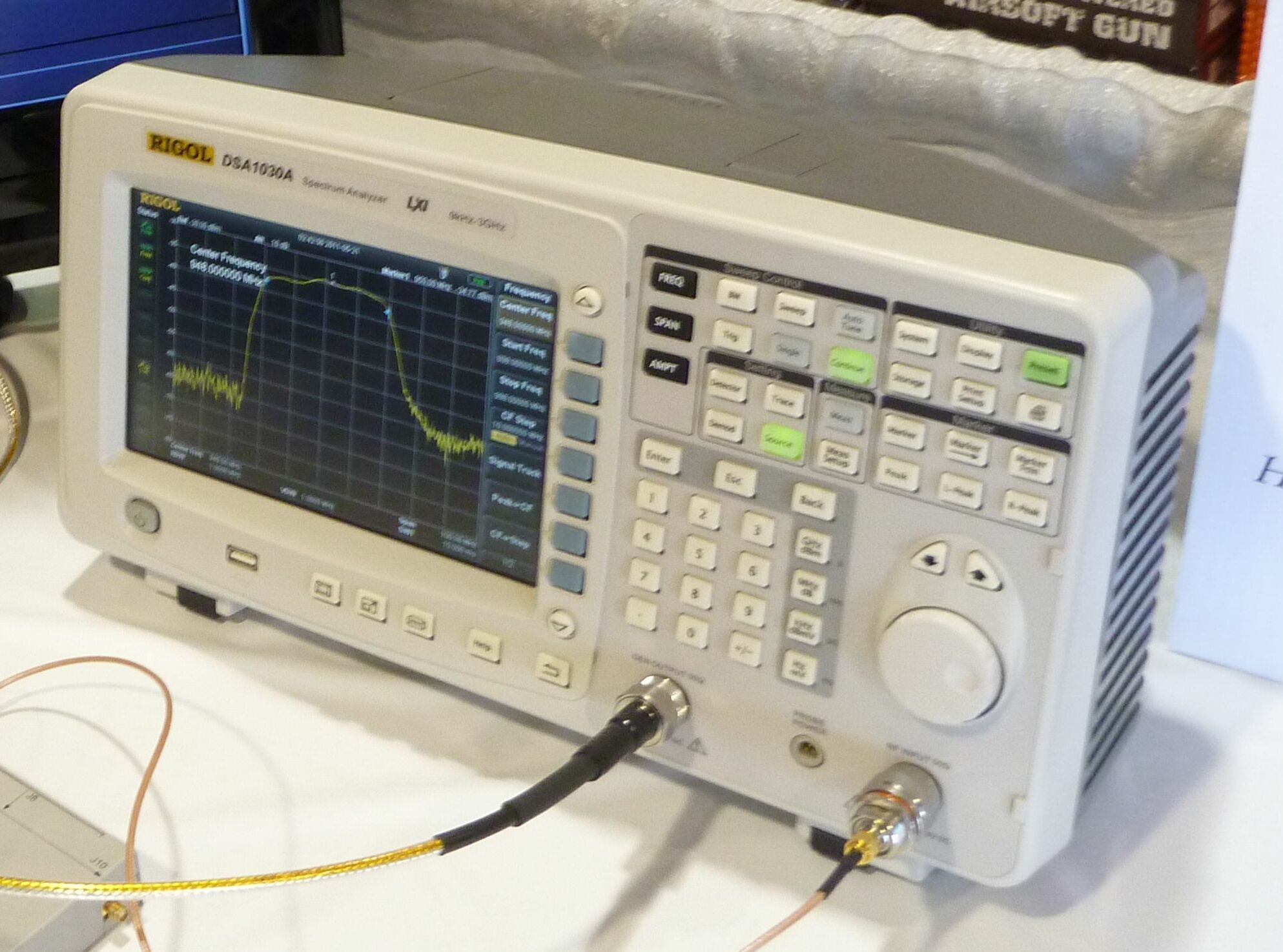 Figure 8 — A benchtop spectrum analyzer (Rigol DSA-series). Paired with a signal or tracking generator, it implements the "poor-man's IEEE-299" directly: a known source outside the shield, the anal…