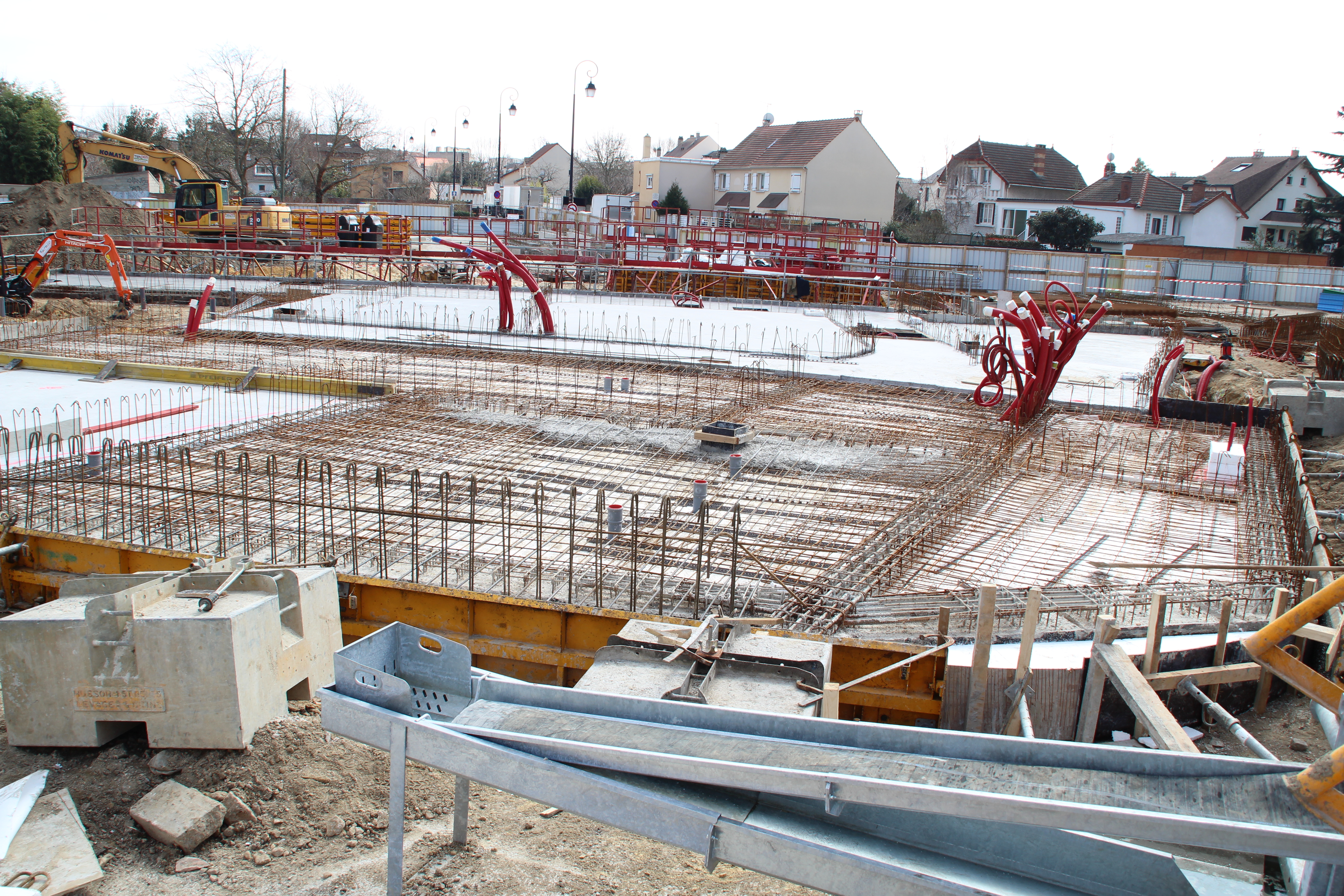 Figure 7 — Reinforced-concrete construction with steel rebar in place before the pour. For open-storage vaults the Tech Spec's hardened tier specifies eight-inch minimum reinforced concrete (2,500 …