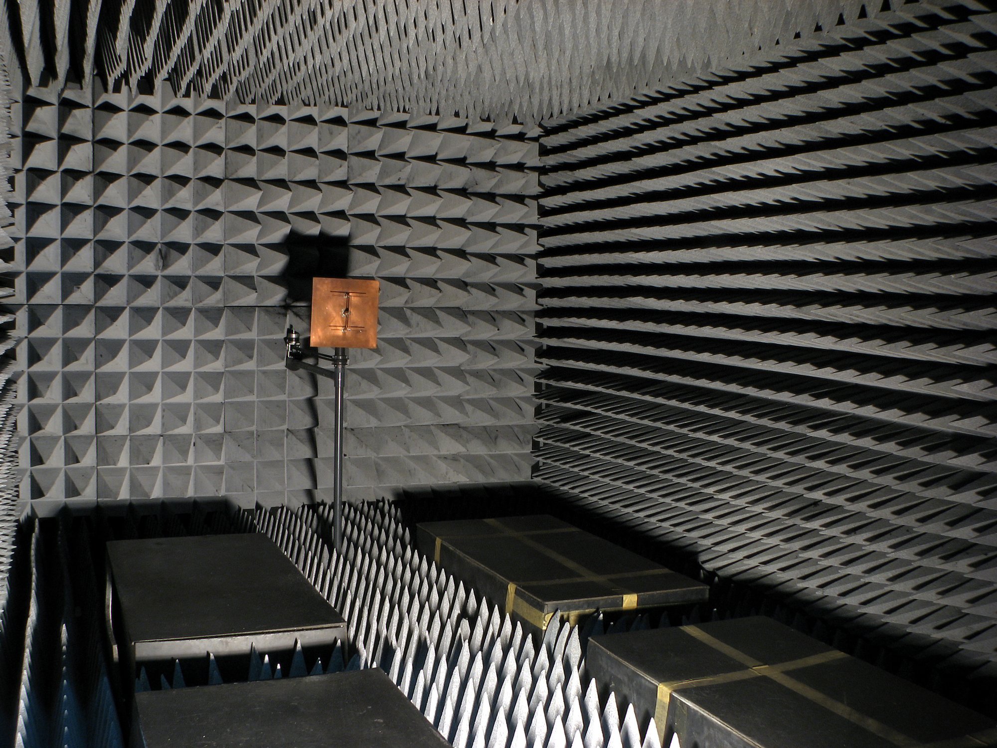 Figure 7 — An RF anechoic chamber: a shielded metal box (the outer envelope is the Faraday shield) lined with pyramidal RF absorber so that measurements inside are free of reflections. The antenna …
