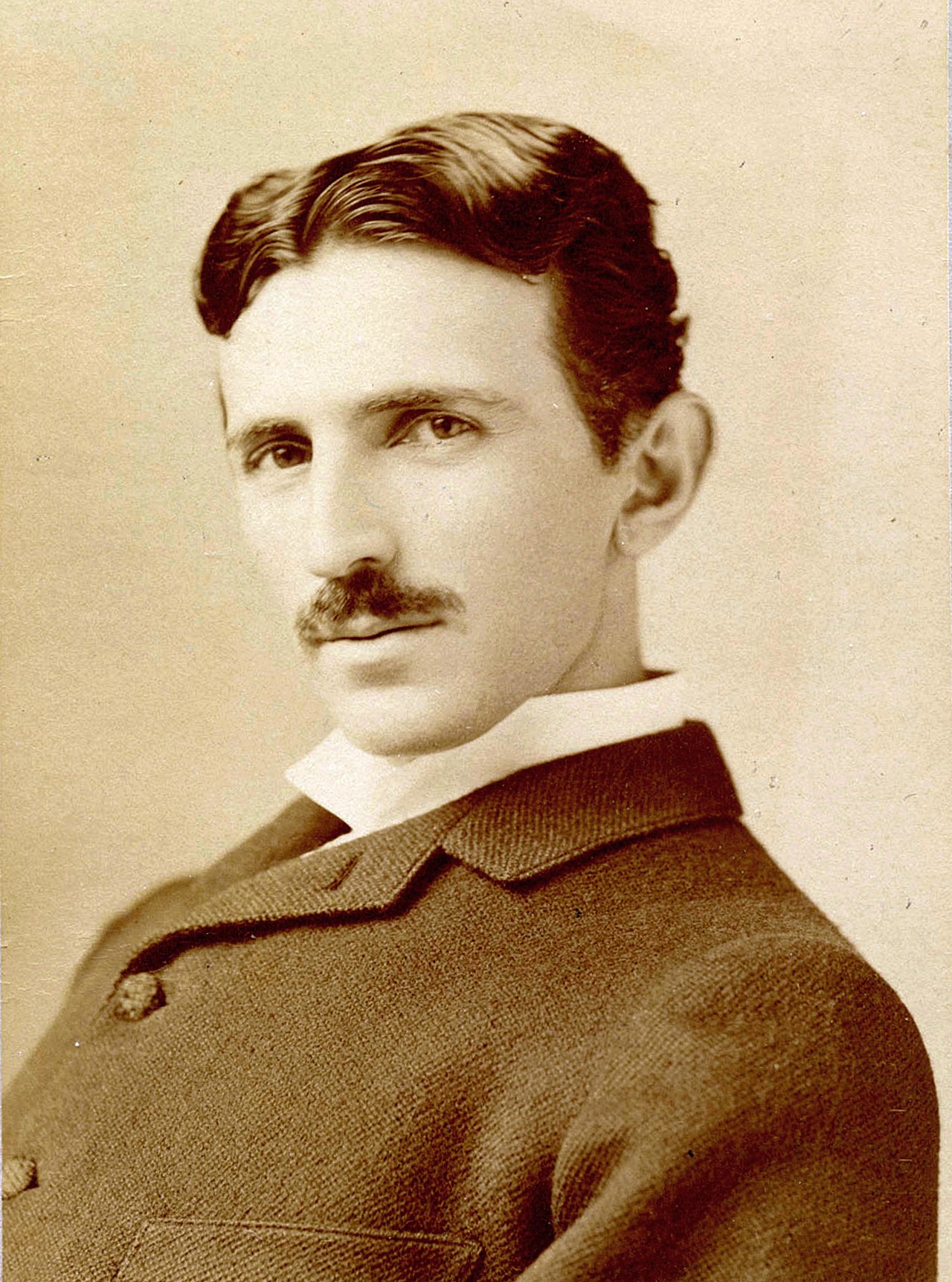 Figure 6 — Nikola Tesla (1856–1943), photographed by Napoleon Sarony around 1890. His polyphase patents of 1888 gave alternating current a practical motor and formed the technical core of the syste…